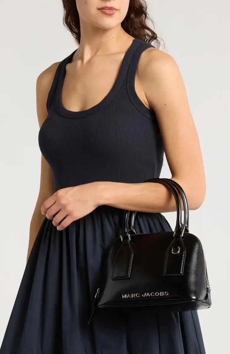 Cartera de mano y crossbody, Marc Jacobs.