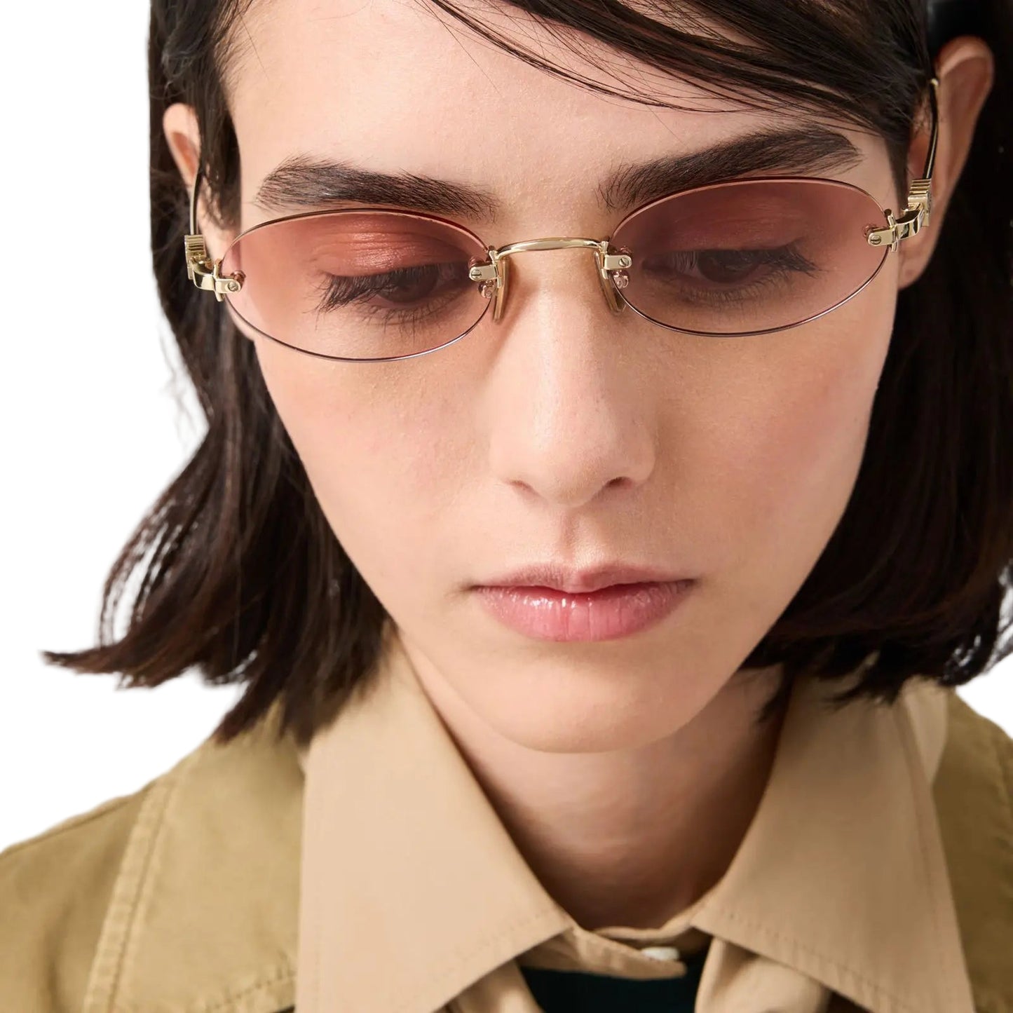 Lentes Miu Miu logo.