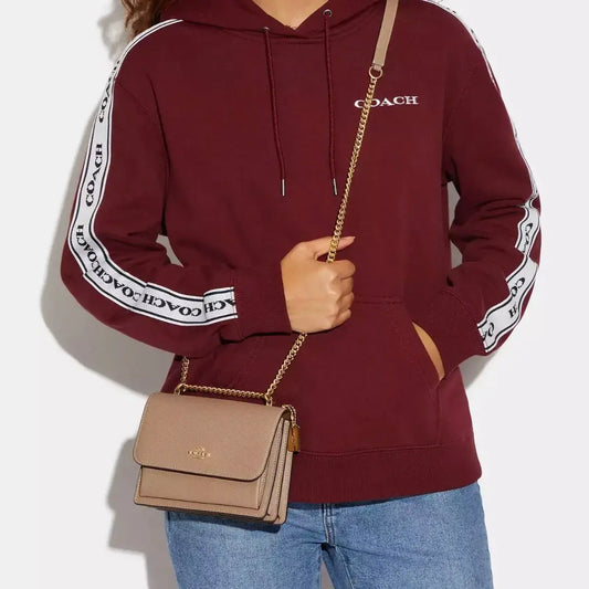Klare Croosbody beige, Coach.