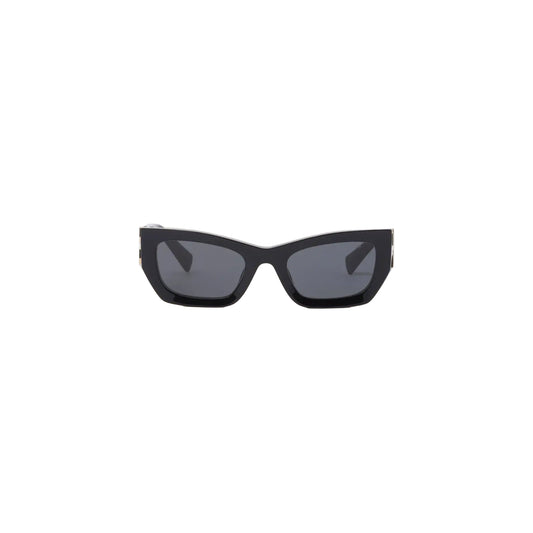 Lentes Miu Miu clásico negro.