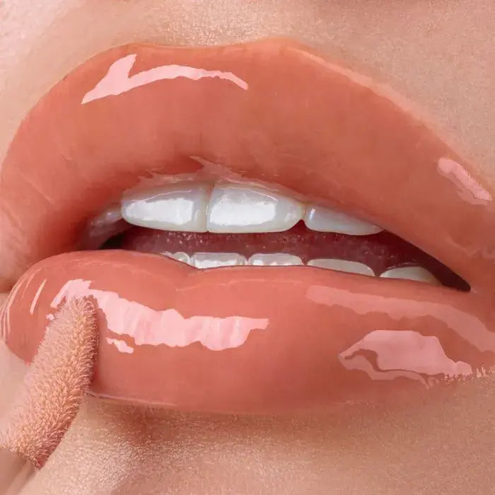 Gisou honey hydrating lip oil.