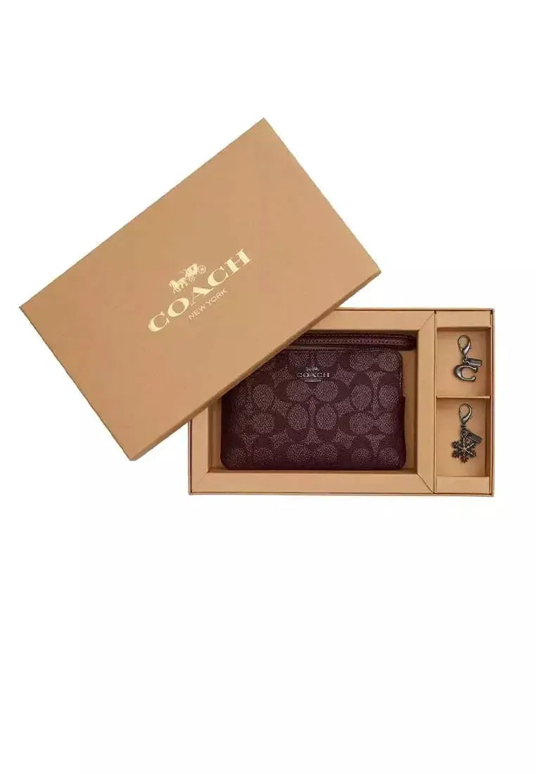Set de muñequera Boxed cornet zip, Coach.
