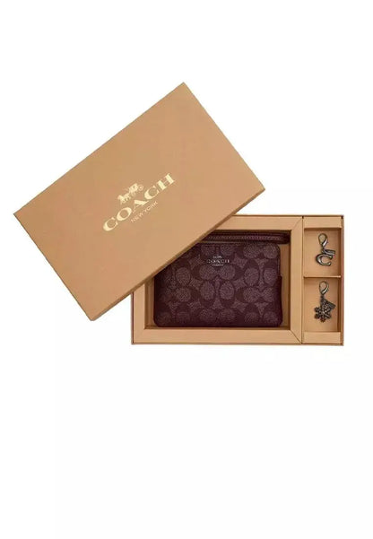 Set de muñequera Boxed cornet zip, Coach.
