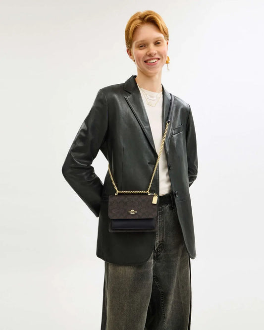 Klare Croosbody black, Coach.